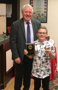 Charlie Rogers receiving the Young Player of the Year Award